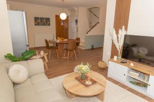 TV a/nebo společenská místnost v ubytování Athena Cocooning Apartment