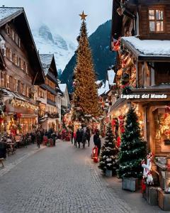 einen Weihnachtsmarkt in einer Stadt mit Weihnachtsbäumen in der Unterkunft Apartamentos Casa Carola in Viodo