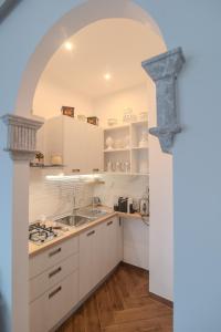 Η κουζίνα ή μικρή κουζίνα στο La Chicca Sicily Holiday House