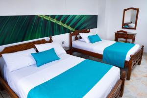 Uma cama ou camas num quarto em Hotel Steven