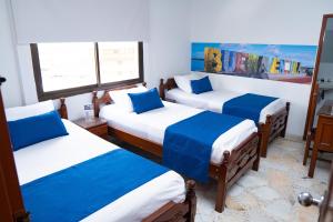 Uma cama ou camas num quarto em Hotel Steven