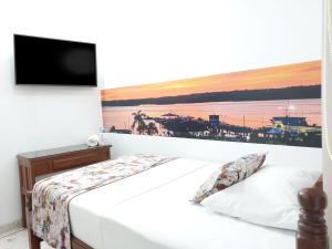 Uma cama ou camas num quarto em Hotel Steven