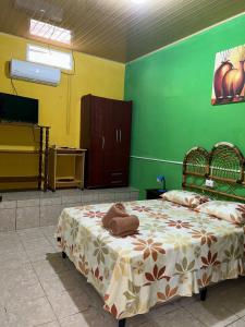 Krevet ili kreveti u jedinici u okviru objekta Casa Maya Itza