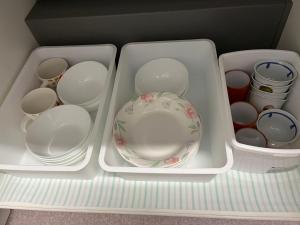 a drawer full of dishes and cups and a plate at N's Home - 南名古屋駅一軒家 - 8 in Nagoya +17 photos