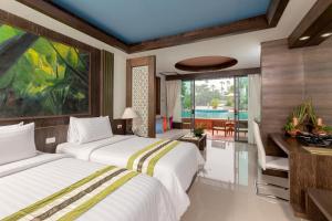 Imagen de la galería de Naina Resort & Spa - SHA Extra Plus, en Patong Beach