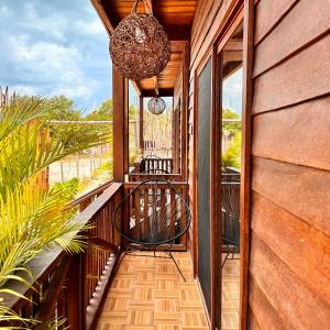 Balkón nebo terasa v ubytování Ecoco Holbox - EcoChic - Cabañas de Madera - Holbox Retreat