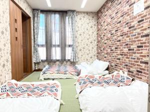 Voodi või voodid majutusasutuse 「鶴橋」駅 徒步9分，新建独栋的别墅，日本桥道顿堀难波梅田USJ神户奈良一线直达 toas