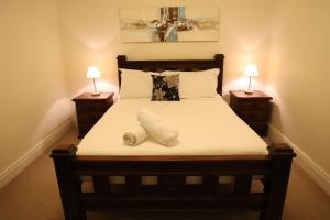 Cama o camas de una habitación en Houses in Goulburn