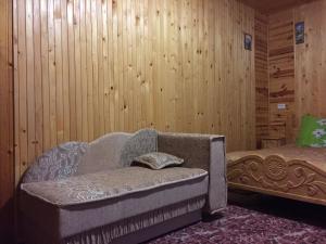 Postel nebo postele na pokoji v ubytování Pryvatna sadyba Svitanok