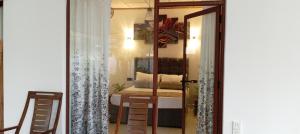 Postel nebo postele na pokoji v ubytování Villa 22 Negombo