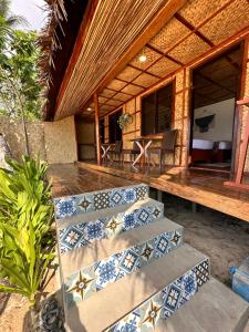 Balkón nebo terasa v ubytování Beach Huts El Nido