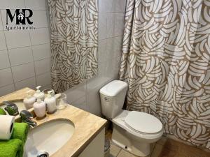 Ванная комната в Acogedor y centrico departamento estudio