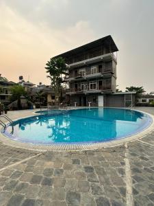 Bassein majutusasutuses Hotel Riverside with Swimming pool või selle lähedal