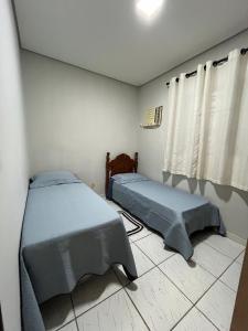 Katil atau katil-katil dalam bilik di Casa com piscina +2 gambar