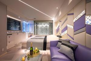TV a/nebo společenská místnost v ubytování Hotel P'sResort Adults only 大人専用 + 28 fotografií