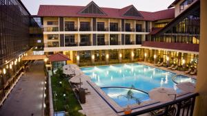 an overhead view of a swimming pool in a hotel at Tang Palace Hotel in Accra