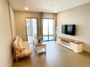 A seating area at Lfamily Ocean view Apartment 91m2 - ARIA Vung Tau Private Beach Resort, căn hộ Aria Vũng Tàu 91 m2 view biển, bãi biển riêng