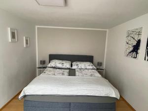 Łóżko lub łóżka w pokoju w obiekcie InNatura Velden
