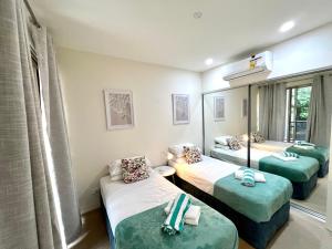 Postel nebo postele na pokoji v ubytování BHA 4- Beachfront Bliss - 2 bed