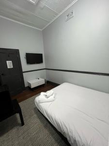 The Federal Hotel客房内的一张或多张床位