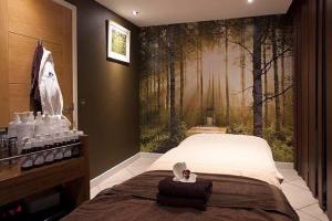 Cama ou camas em um quarto em Captain's Club Hotel & Spa