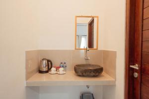 Kúpeľňa v ubytovaní Brisk Homestay at Uluwatu RedPartner