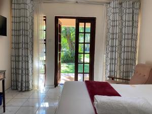 Ένα ή περισσότερα κρεβάτια σε δωμάτιο στο Matilinda Lodge +35 φωτογραφίες