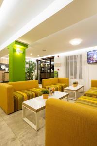 Posezení v ubytování Hotel Compliment