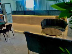 Posezení v ubytování رويال جروب اربد Royal Group Hotel