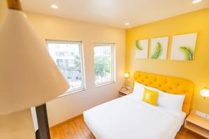 Postel nebo postele na pokoji v ubytování Bloom Hotel - Richmond Road