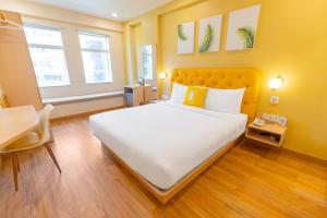 Postel nebo postele na pokoji v ubytování Bloom Hotel - Richmond Road