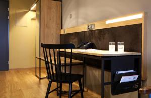 Kuchyň nebo kuchyňský kout v ubytování Hotel Cinema 8