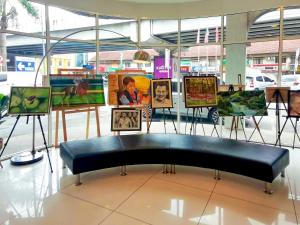 a display in a store with a bench in a room at Tune Hotel – Kota Bharu City Centre in Kota Bharu