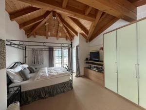 Postel nebo postele na pokoji v ubytování Villa Kitzbühel