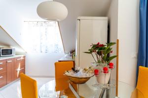 Kuchyň nebo kuchyňský kout v ubytování Apartmani Kadena