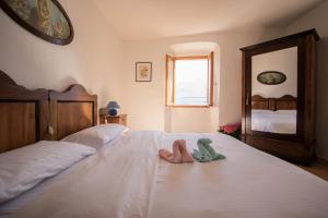 Postel nebo postele na pokoji v ubytování B&B Pregasina