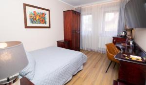 Katil atau katil-katil dalam bilik di Hotel Legend