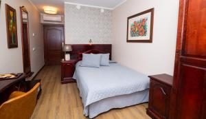 Katil atau katil-katil dalam bilik di Hotel Legend