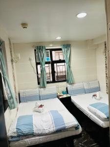 Cama o camas de una habitación en Holland Guest House