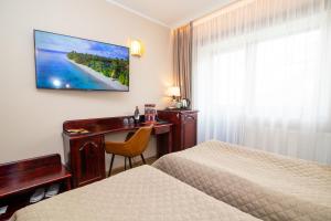 Katil atau katil-katil dalam bilik di Hotel Legend