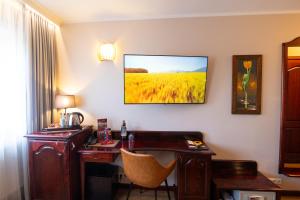 Televisyen dan/atau pusat hiburan di Hotel Legend