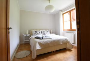 Posteľ alebo postele v izbe v ubytovaní Ski & Bike Apartment - Apartamenty Pod Śnieżką