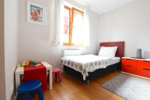 Posteľ alebo postele v izbe v ubytovaní Ski & Bike Apartment - Apartamenty Pod Śnieżką