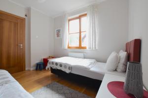 Posteľ alebo postele v izbe v ubytovaní Ski & Bike Apartment - Apartamenty Pod Śnieżką