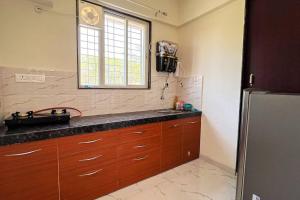 Dapur atau dapur kecil di A Homely 1 BHK in Main Kharadi - Anandkunj +14 gambar