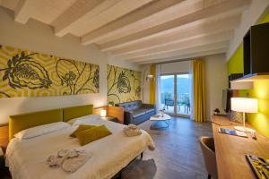 Postel nebo postele na pokoji v ubytování Ca' Barbini Resort