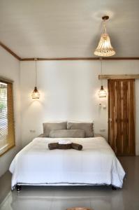 Postel nebo postele na pokoji v ubytování Ripbowl Guest House