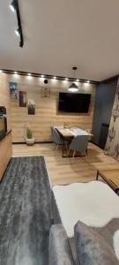 Ruang duduk di Apartamenty Trzy Kopce Ski & Bike & Sauna