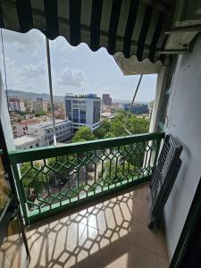a balcony with a view of a city at Tirana Daily Rental Apartments 3 in Tirana