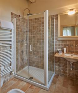 Ett badrum på Pamperduto Country Resort